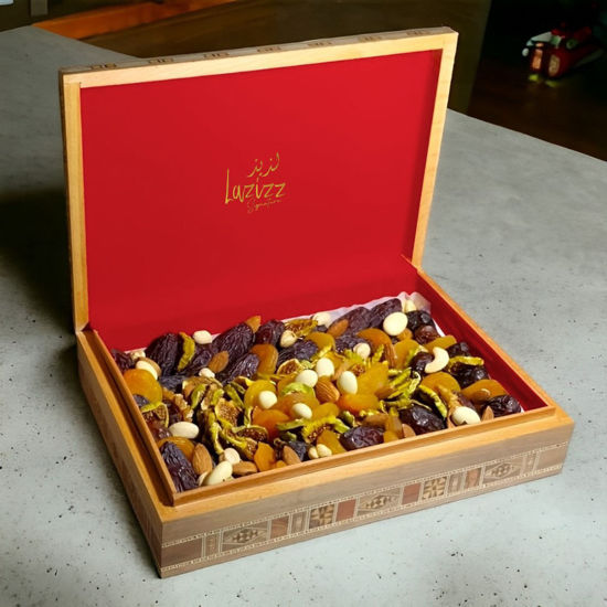 Experience luxury with our Wooden Box Mix, featuring a curated selection of premium Majool dates, succulent apricots, flavorful figs, and assorted mixed nuts. Perfect for gifting or indulging in a moment of luxury.